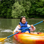 woman in kayak on river