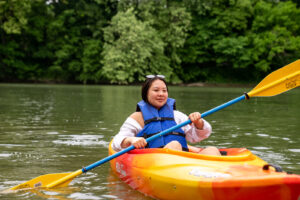 woman in kayak on river